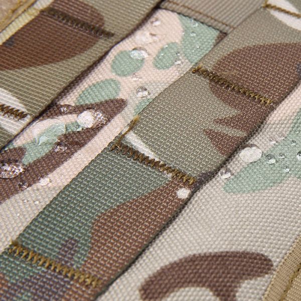Close-up of water droplets on a Tactical Scorpion Gear - Level IIIA Dog Body Armor Canine K9 Police Vest Harness D5 camouflaged fabric surface.