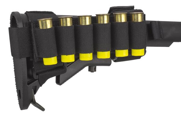 Sentence with replacement: A Elite Survival Systems buttstock with a black attached ammunition pouch holding five yellow-tipped shotgun shells.
