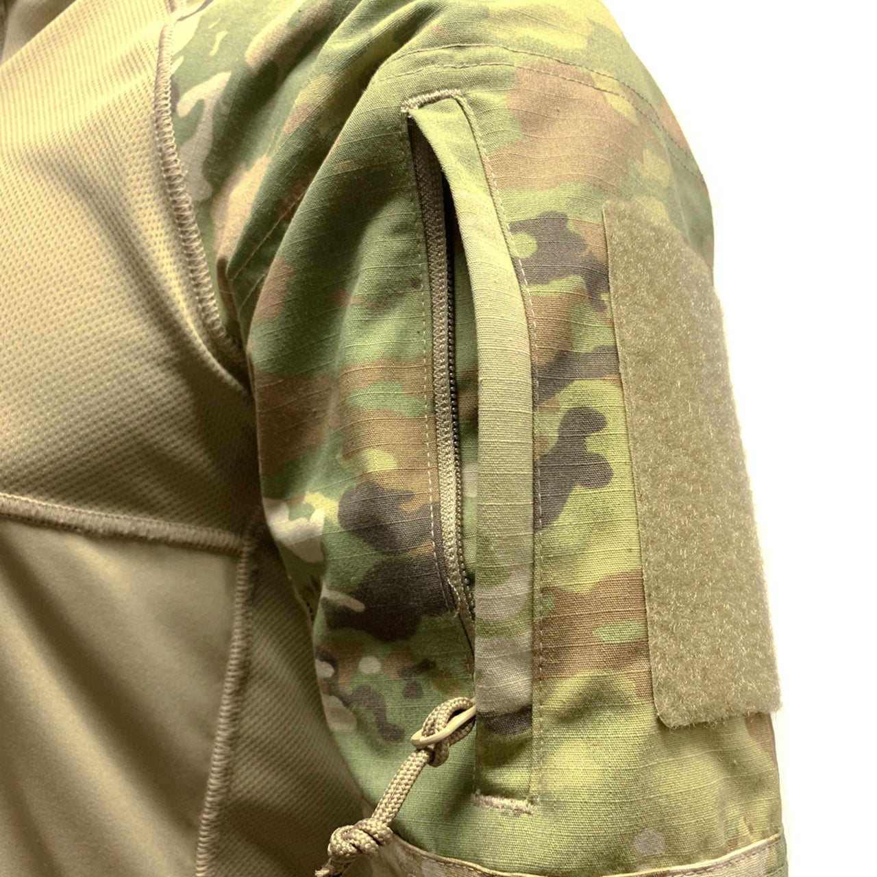 A close up of a Shellback Tactical Shellback Tactical 1/4 Zip Combat Shirt.