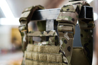 Thumbnail for A Predator Armor Minuteman Plate Carrier hanging on a rack.