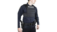 Thumbnail for A police officer wearing an Elite Survival Systems MOLLE Adaptable Lightweight Plate Carrier.