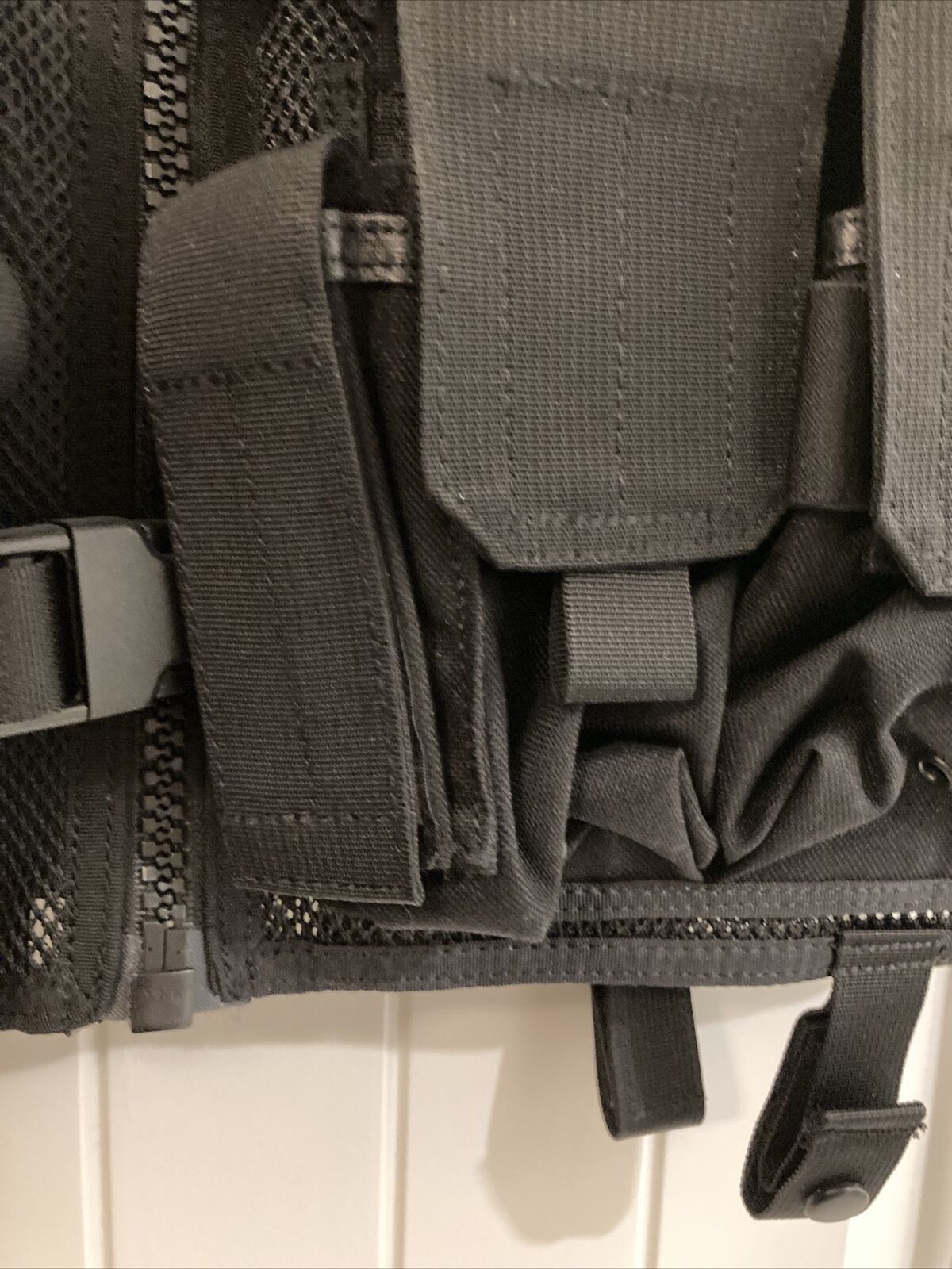 An Elite Survival Systems MVP Payload Tactical Vest with a lot of compartments.